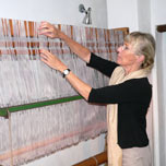 Arranging the warp yarns on the loom 